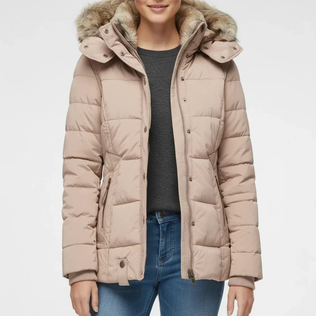 Veste matelassée à capuche pour femmes avec bordure en fausse fourrure